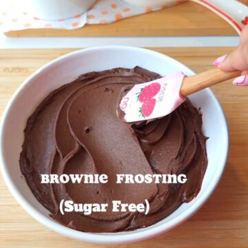 A white bowl filled with brownie batter (chocolate) frosting