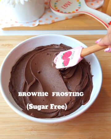 A white bowl filled with brownie batter (chocolate) frosting