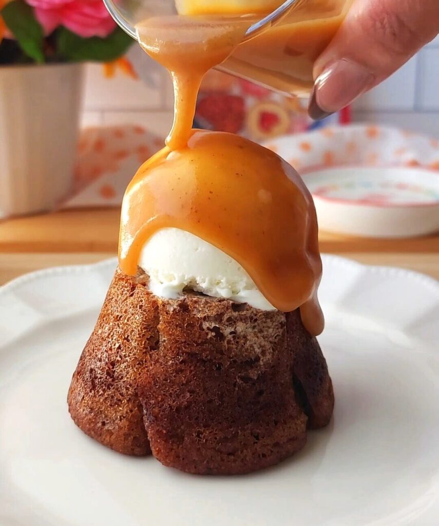 pouring caramel on top of Sticky Toffee Pudding